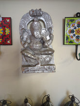 Hand-carved wooden Ganesh in silver