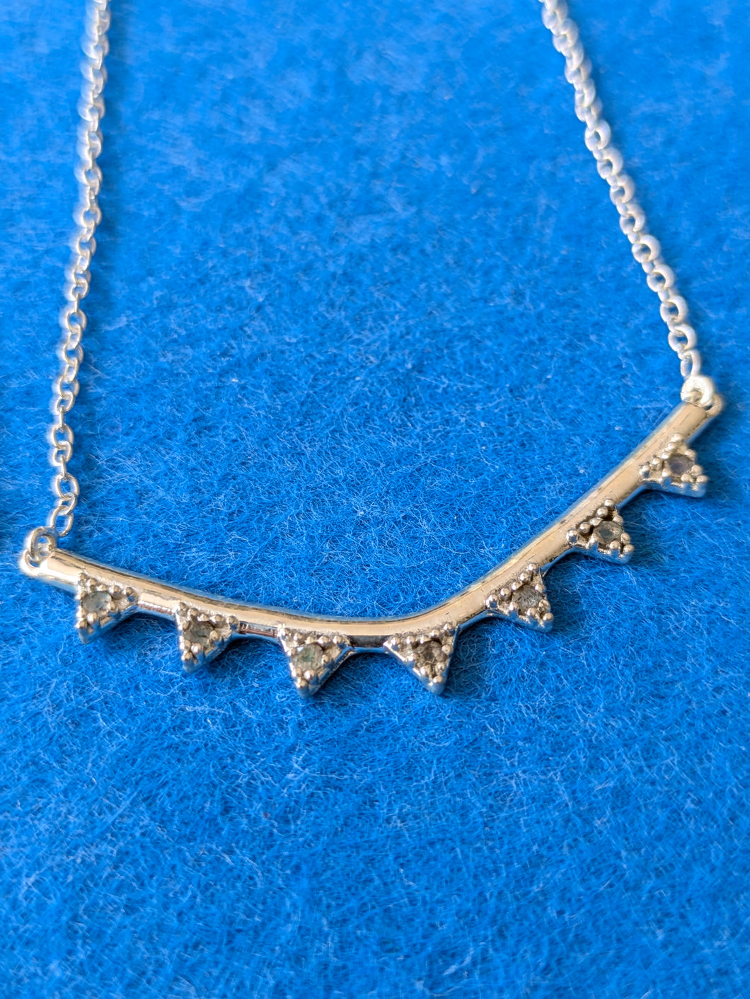 Indian silver curve and stone necklace