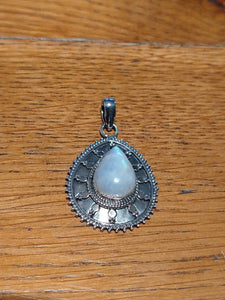 Tear shape embellished pendant with stone