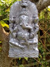 Hand-carved wooden Ganesh in silver